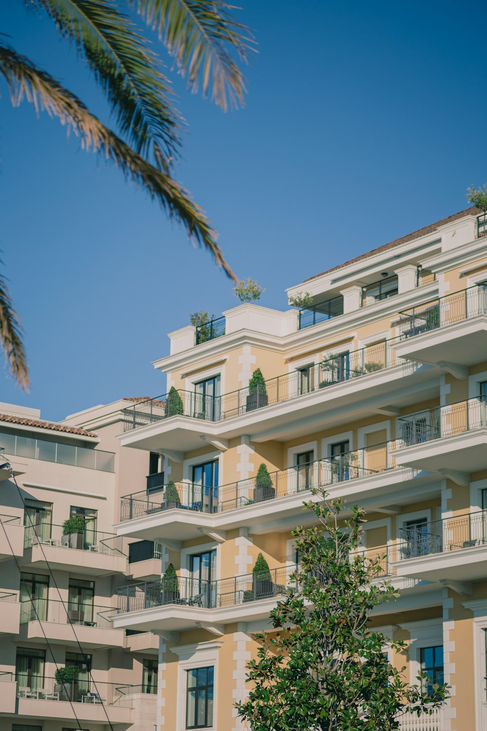 a tall building with balconies and balconies on the balconies