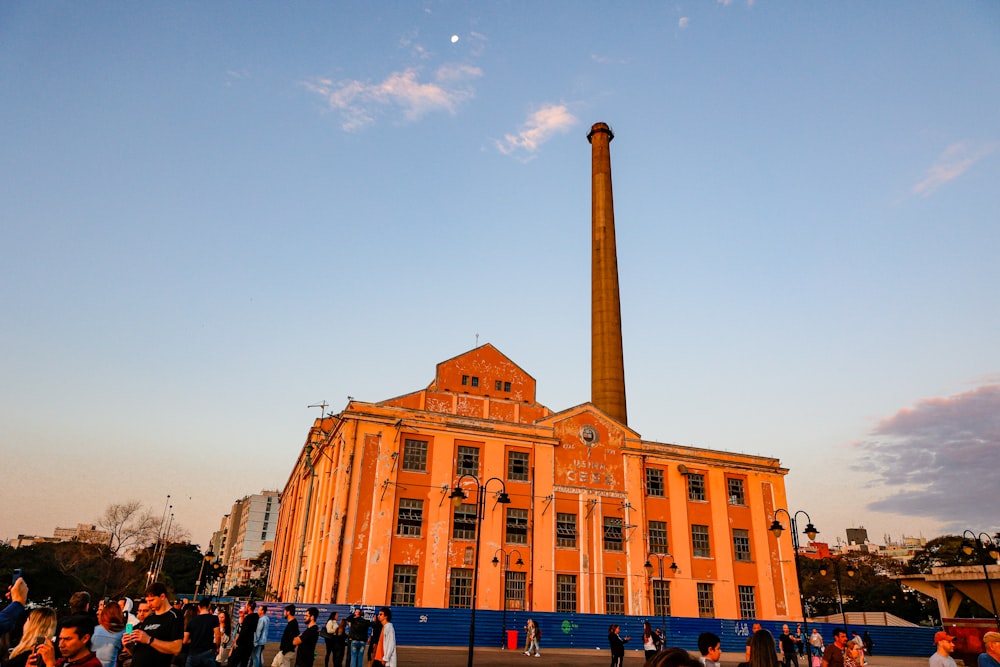 a group of people standing in front of a building