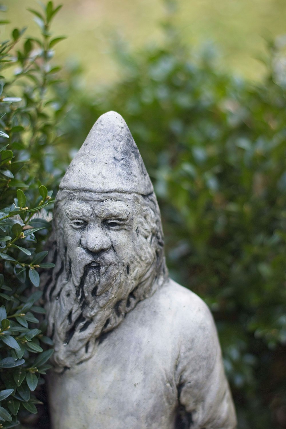 a statue of a man with a beard and a beard