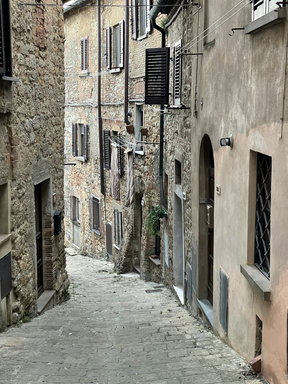 a cobblestone street in an old european city