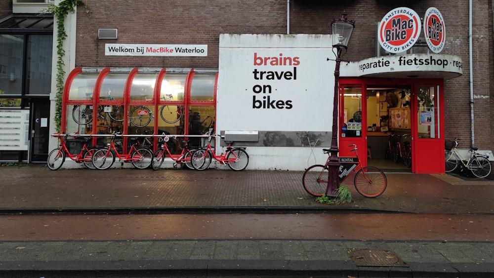 a bike parked in front of a bike shop