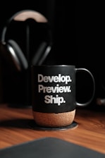 a coffee cup with a message on it sitting on a table