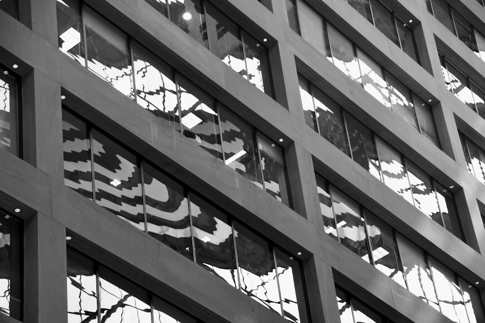 a black and white photo of a building's windows