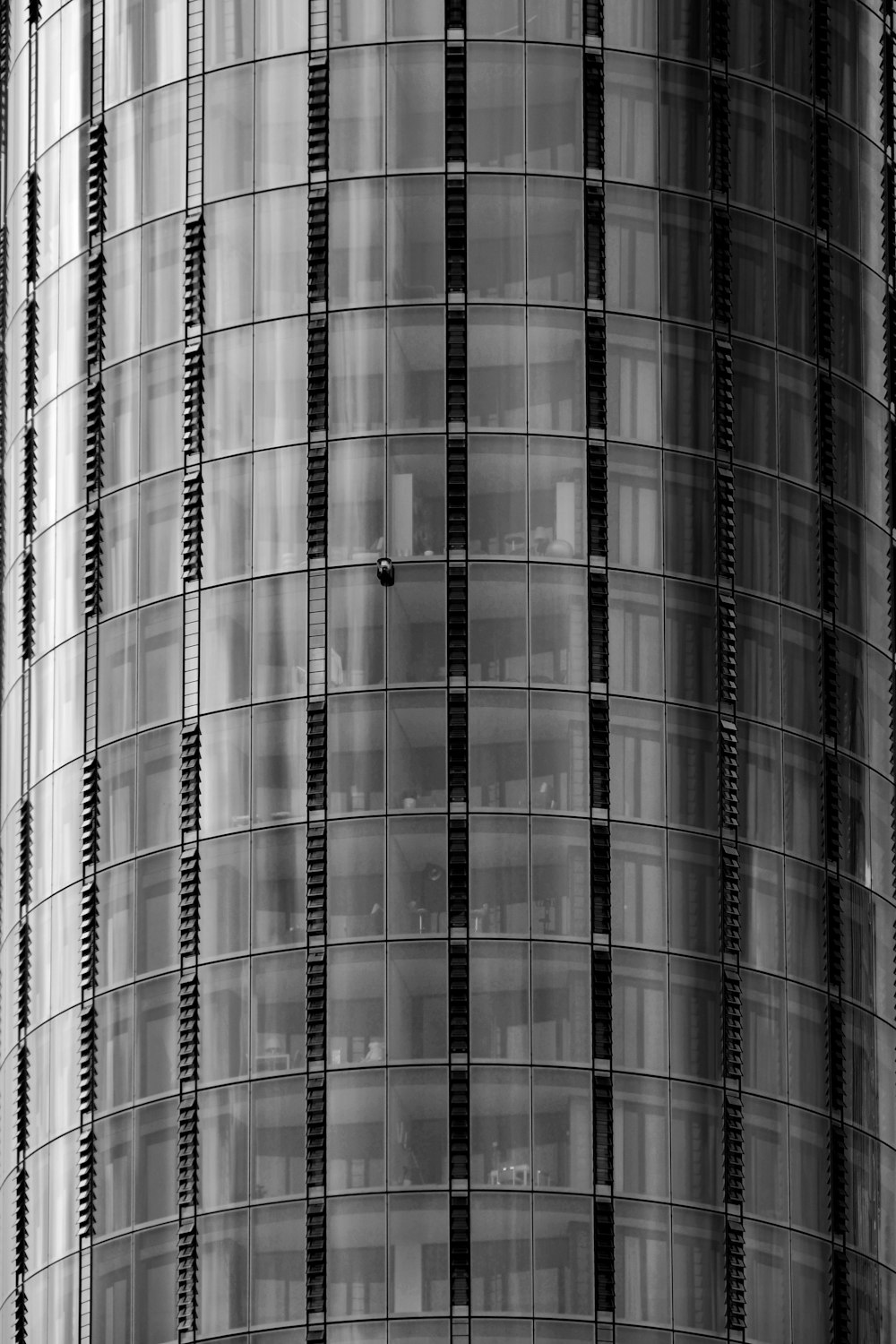 a black and white photo of a tall building