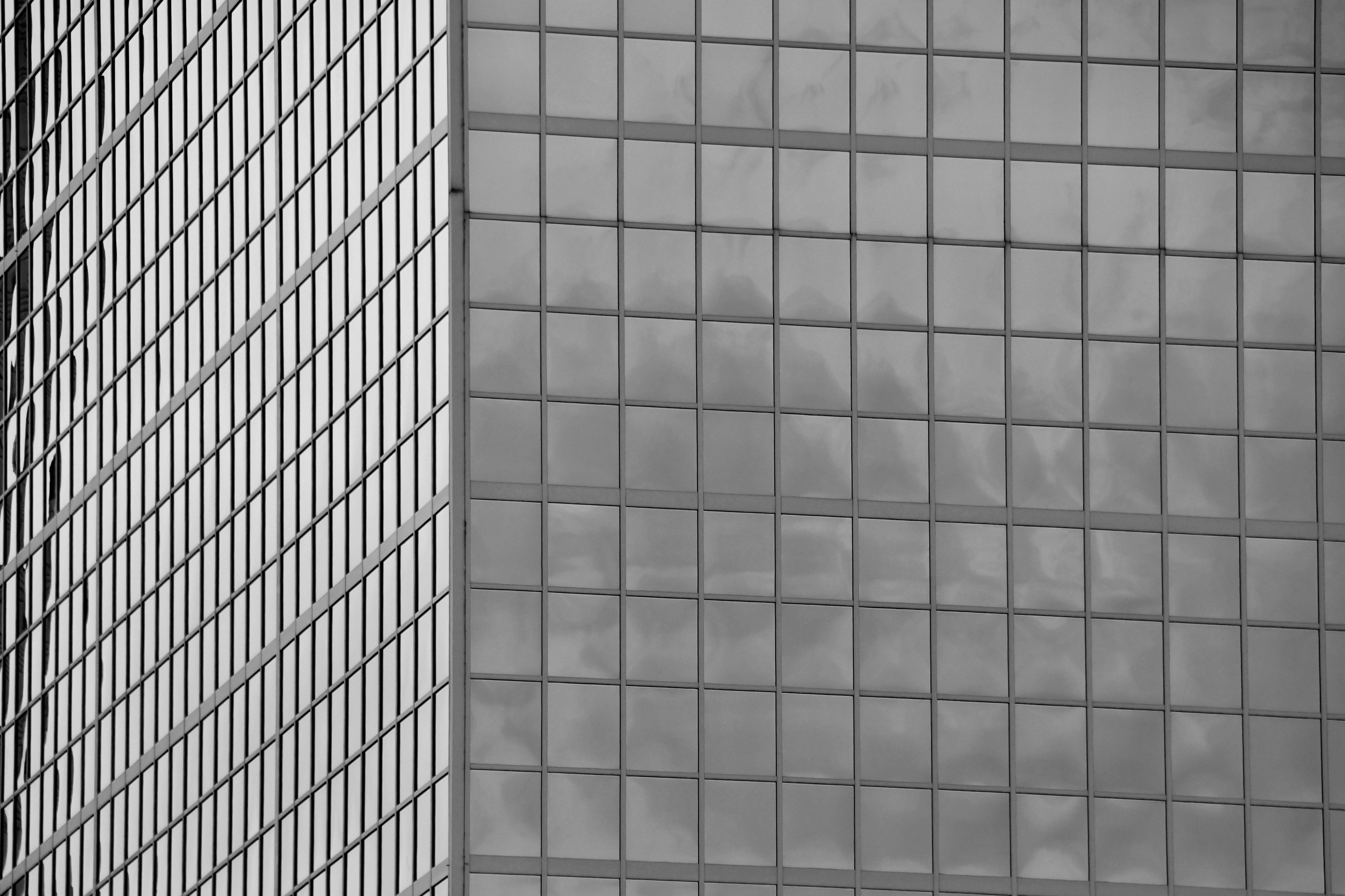 a black and white photo of a tall building