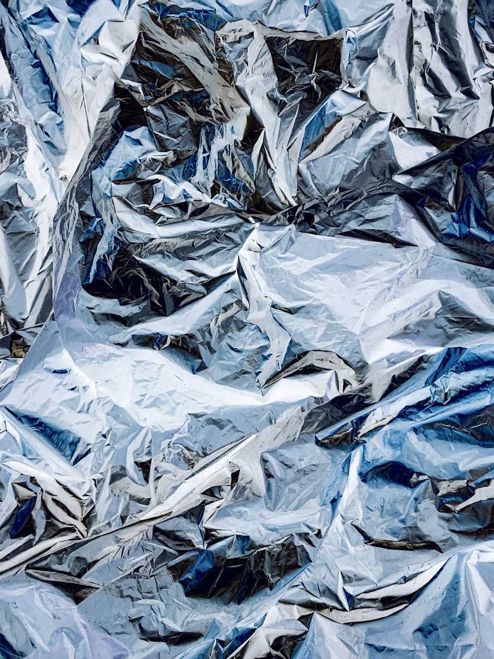 a pile of aluminum foil sitting on top of a table