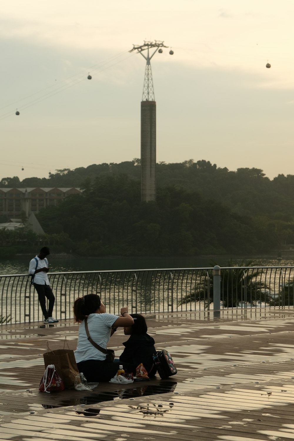 a couple of people that are sitting on a bench