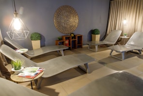 Relaxing spa lounge area featuring cozy seating and tranquil decor.