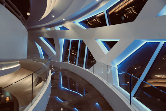 An immersive virtual walkthrough of a futuristic building interior designed with vibrant colors and dynamic lighting.