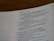 A close-up view of a Bible page, showing text from the Book of Isaiah, chapter 14:9. The text appears to be printed in black ink on white paper, with verse numbers listed alongside each verse.