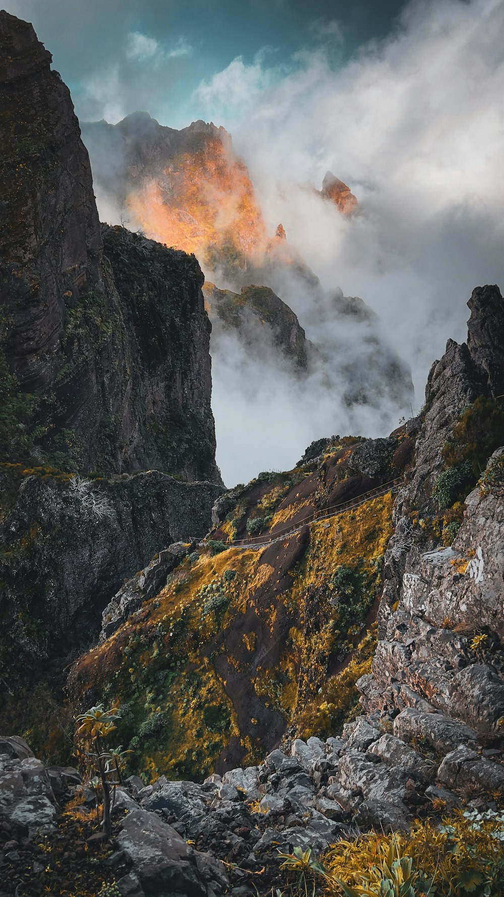 a mountain with a fire coming out of the top of it