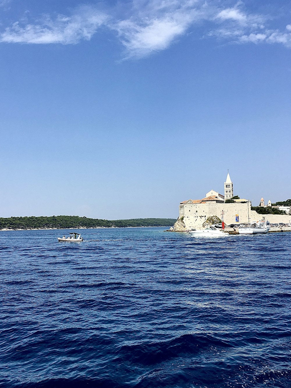 a small boat in a large body of water