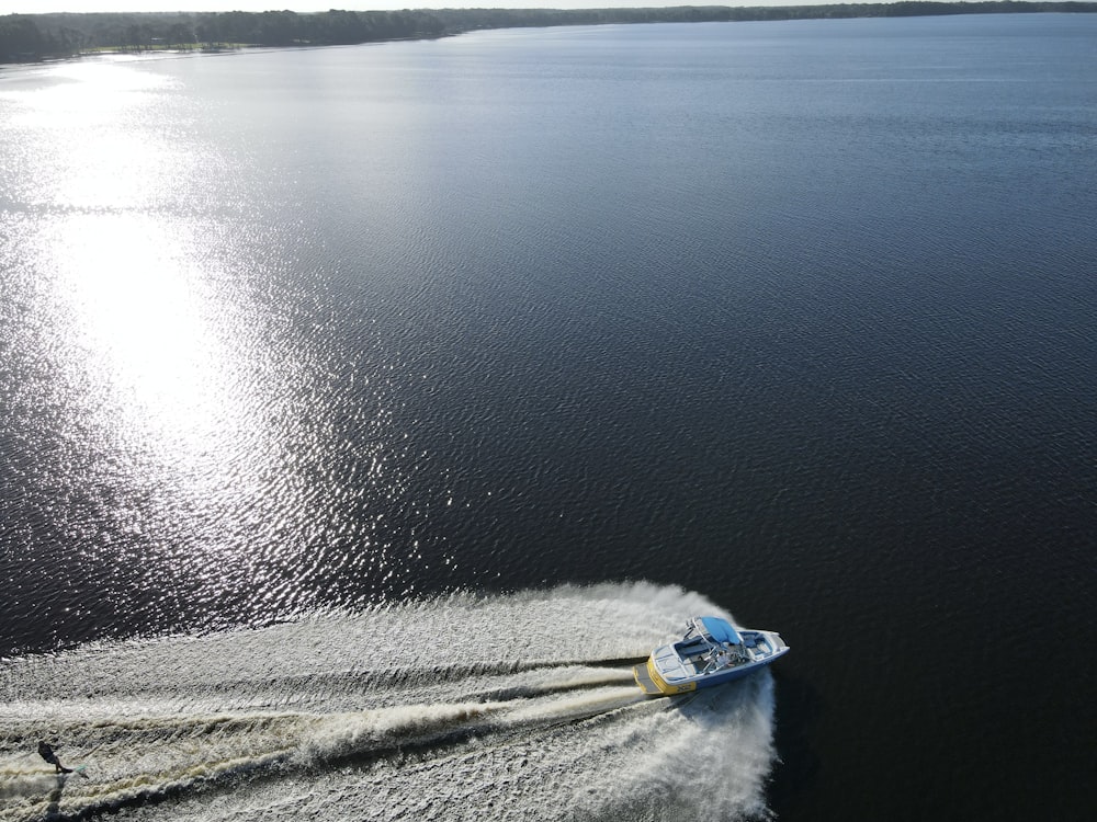 a boat traveling across a large body of water