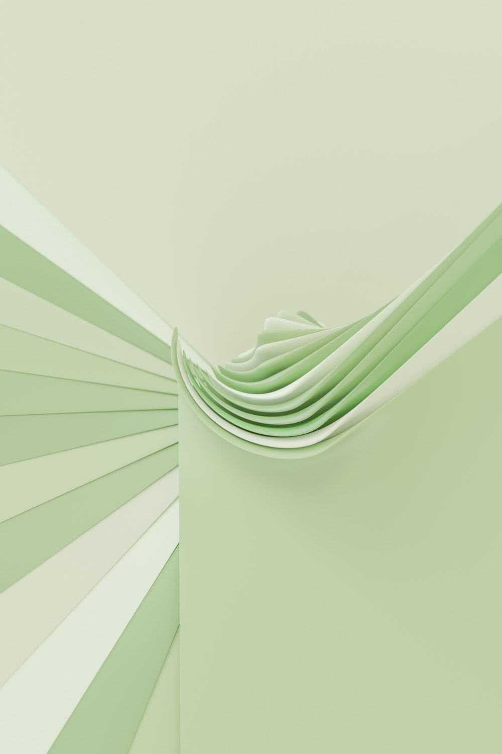 a green and white wall with a stack of folded papers