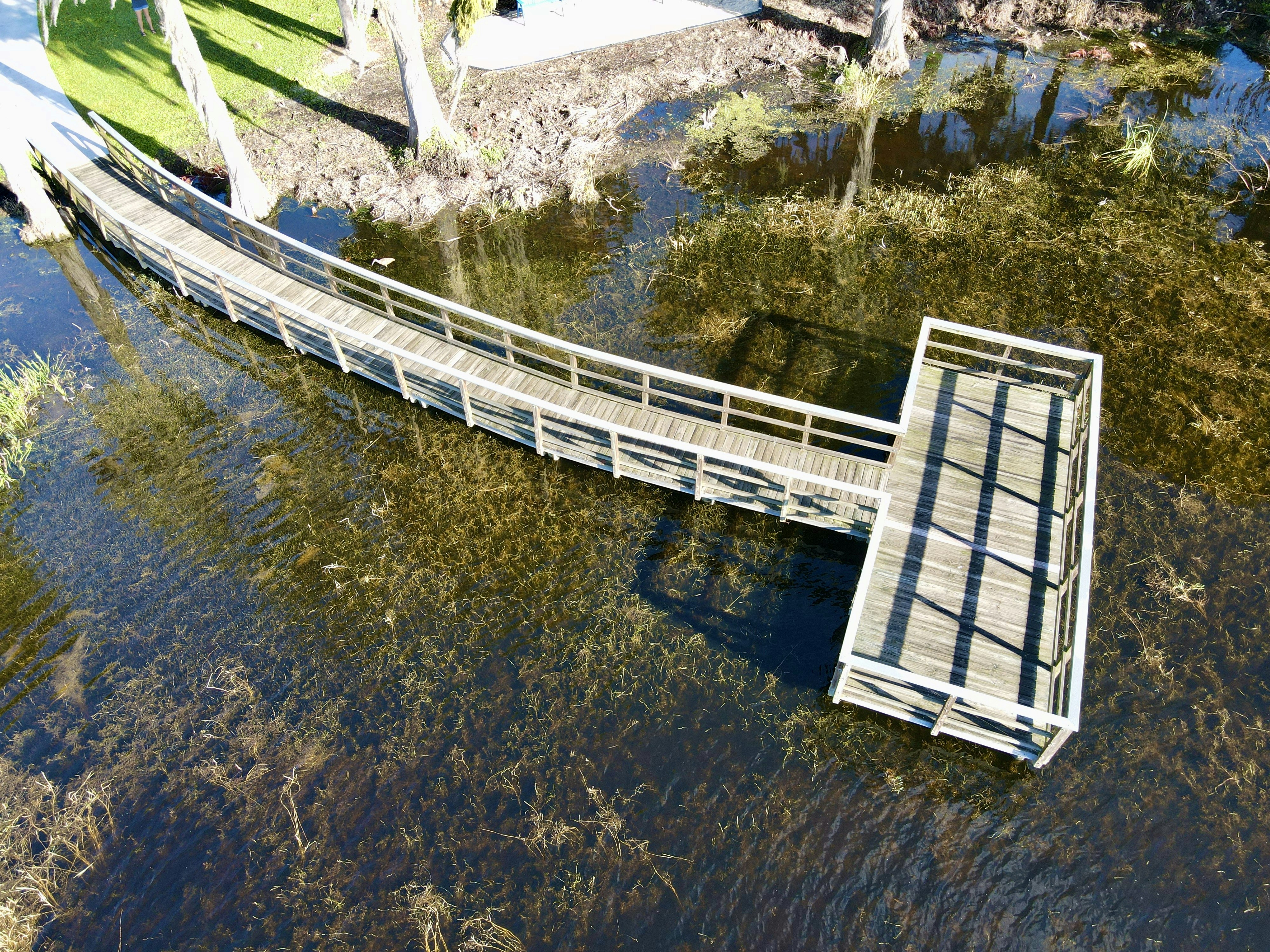 a wooden bridge over a body of water