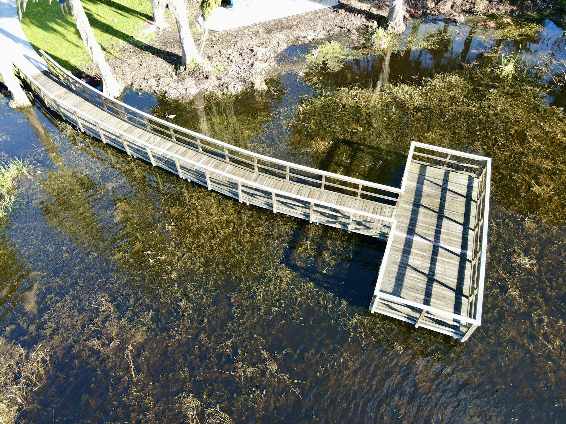 a wooden bridge over a body of water