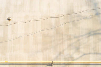 Technician using advanced leak detection equipment inside a residential wall.