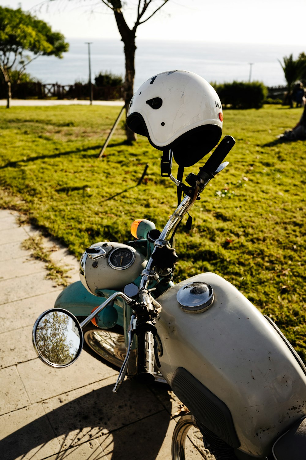 a motorcycle parked on the side of a road