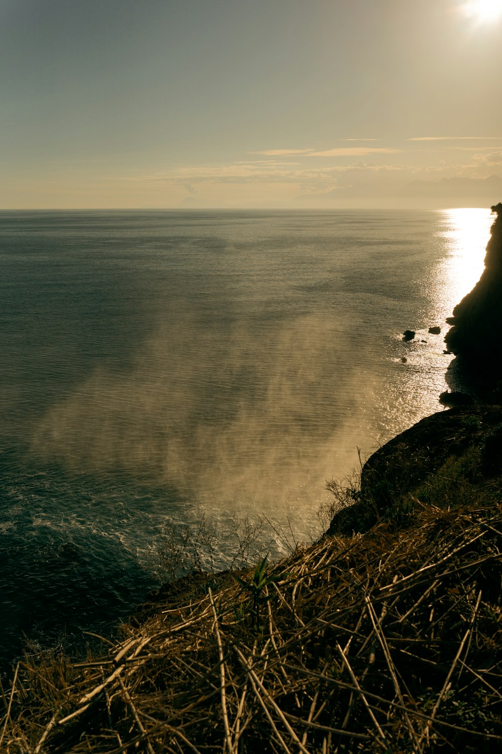 a view of the ocean from a cliff