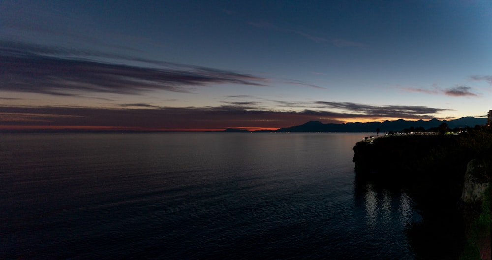 a view of a body of water at dusk