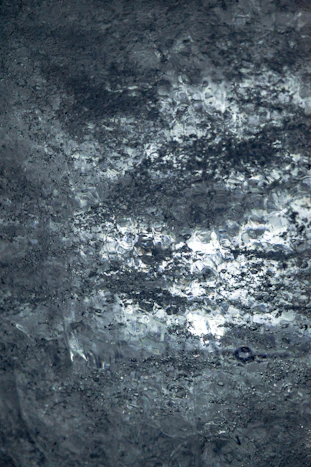 a black and white photo of the surface of a surface