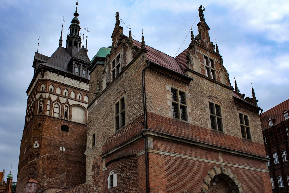 a large brick building with a clock tower