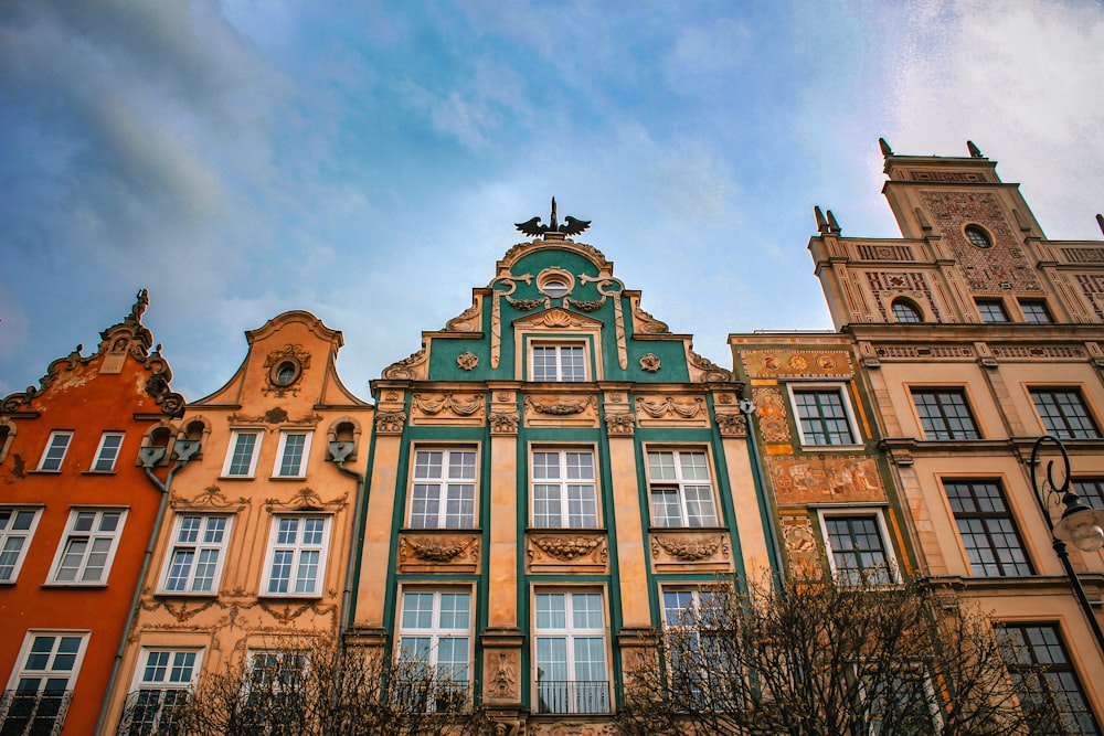 a tall building with a clock on the top of it