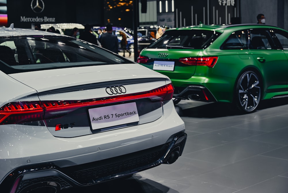 a couple of cars that are on display