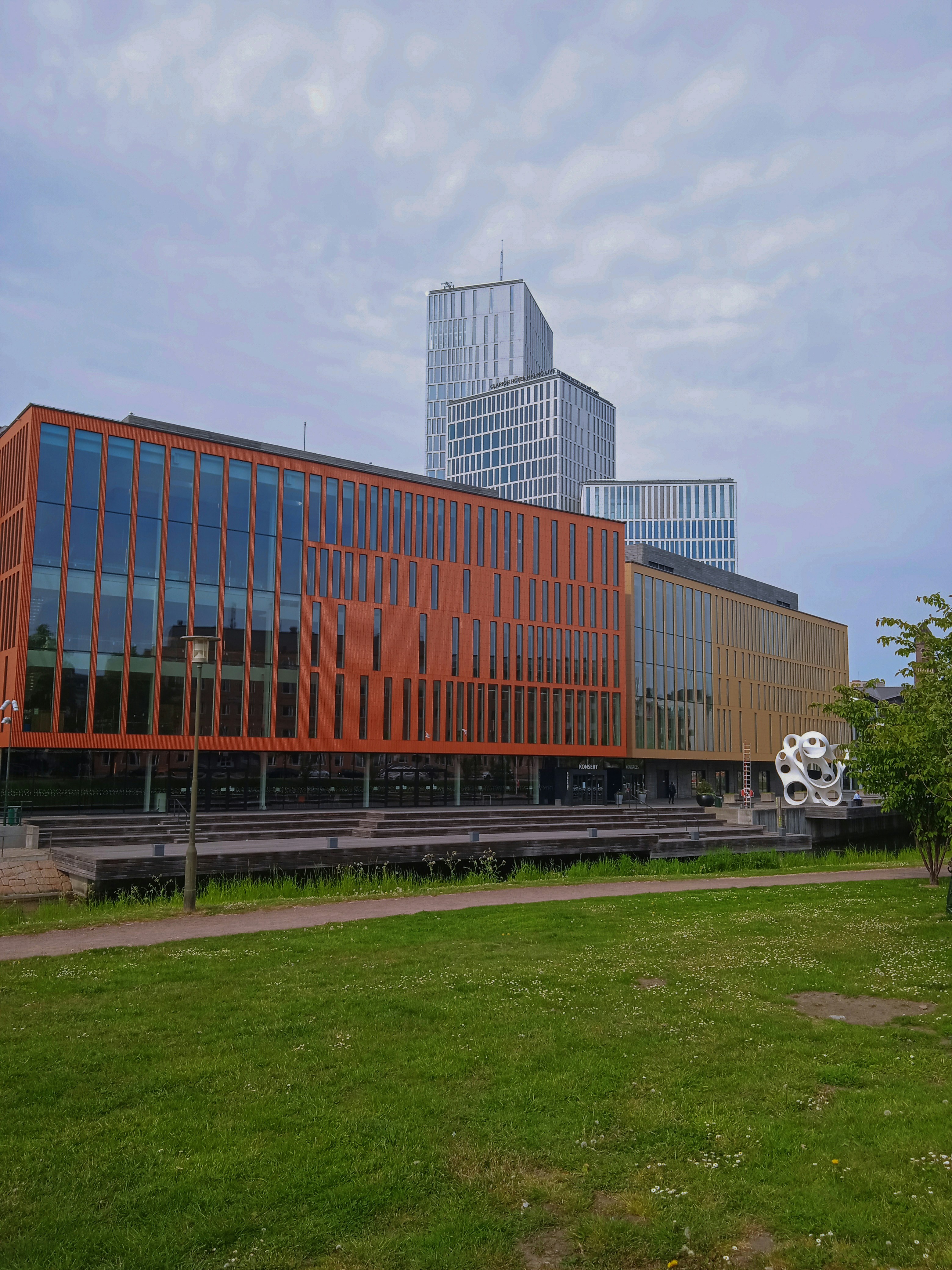 a large building with a lot of windows on top of it