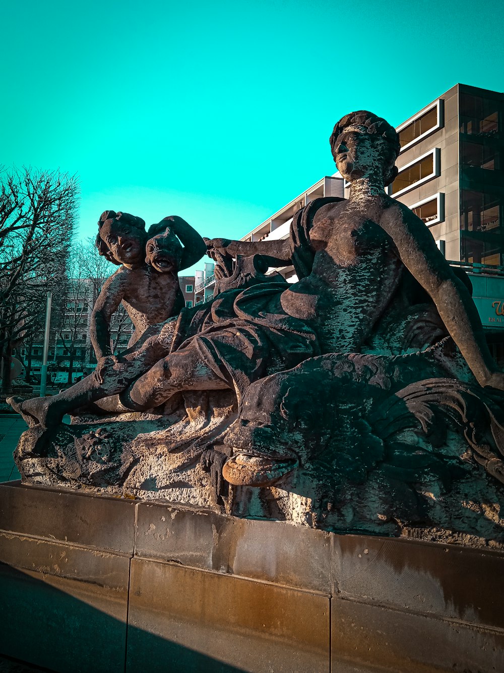 a statue of a woman holding a child