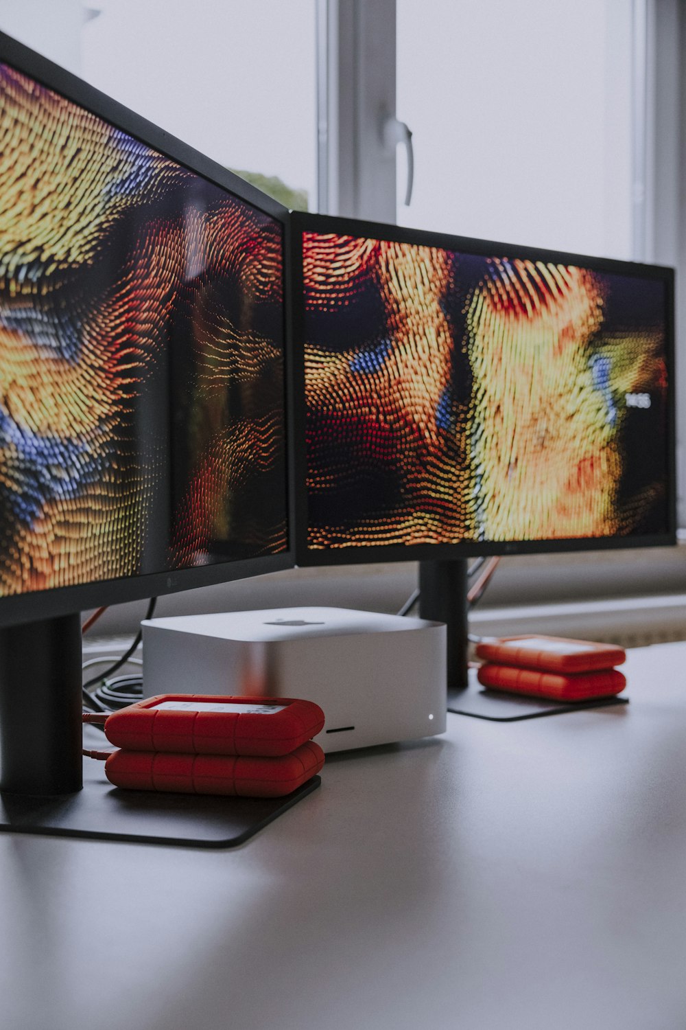 a computer monitor sitting on top of a desk