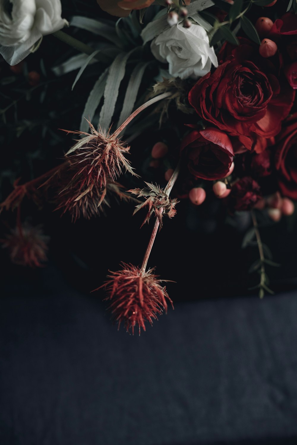 a bunch of flowers that are on a table