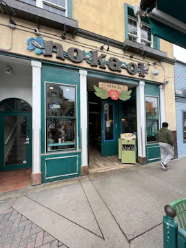A boutique shop in Kailua with a welcoming storefront and a website on display