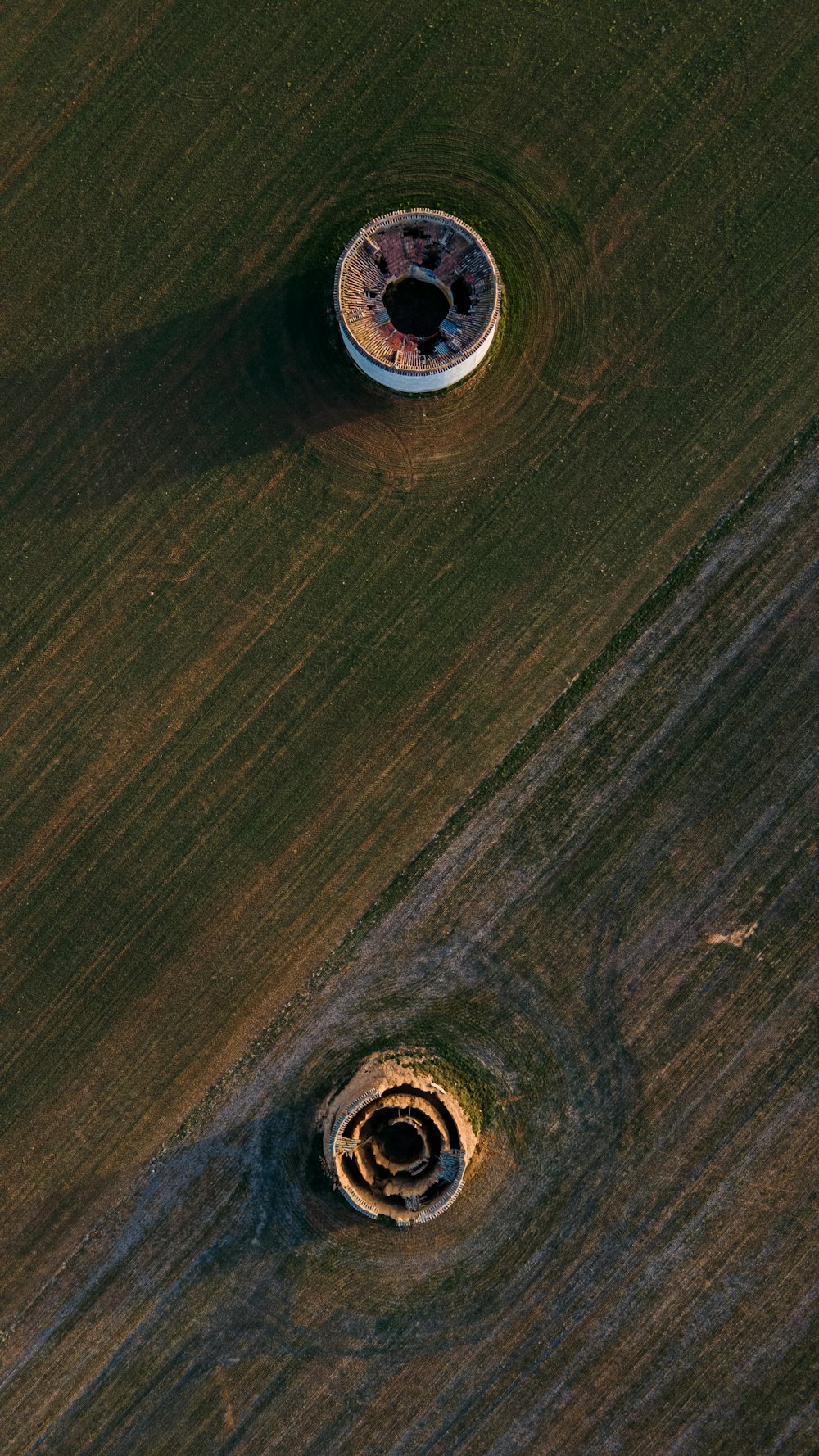 two round holes in the middle of a field