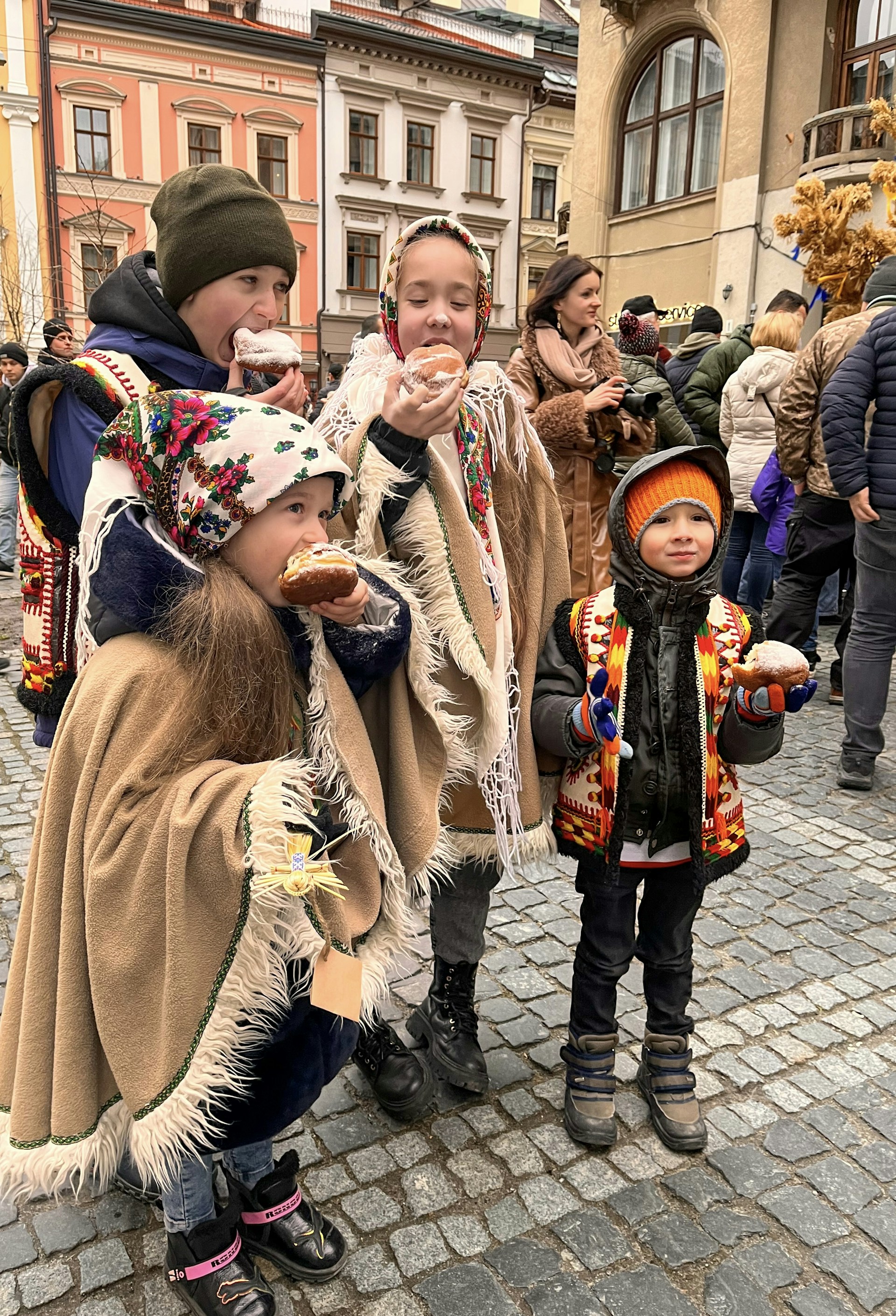 Zwartepieten handing out sweets to excited kids near the Houtdok in Ghent.