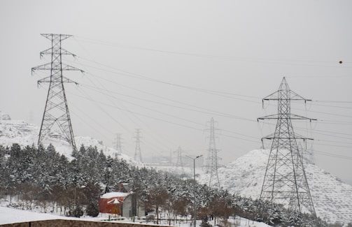 Aerial view of transmission towers stretching over Ontario countryside.