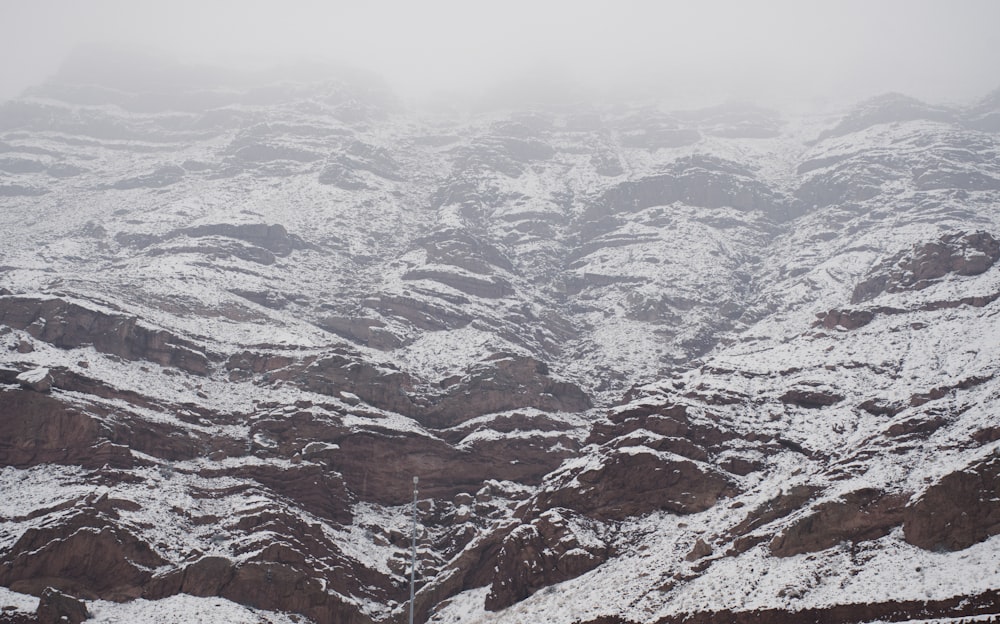 a mountain covered in snow with lots of snow on it