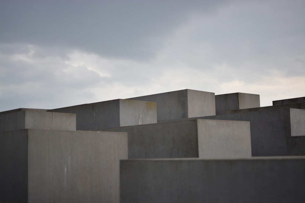 a group of cement blocks sitting next to each other