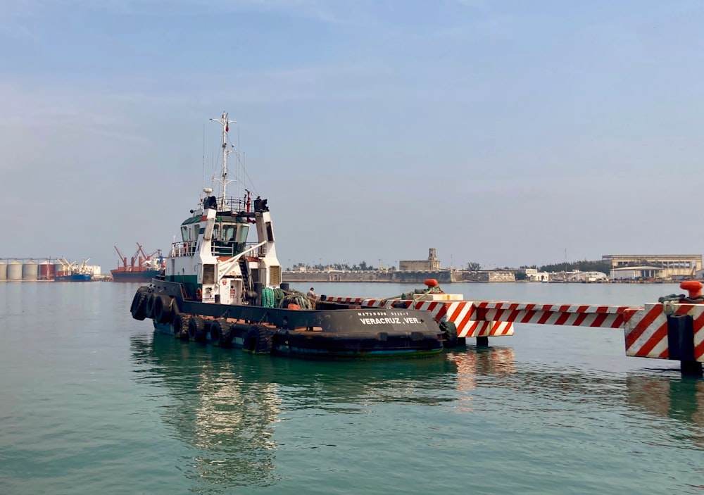 a tug boat in a body of water