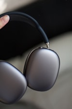 Side view of osseowave headphones showing bone conduction pads near the cheekbones.