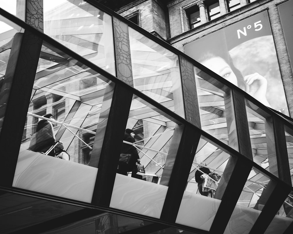 a black and white photo of a building's windows