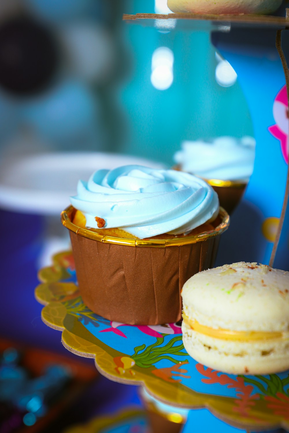 a plate with a cupcake and a cupcake on it