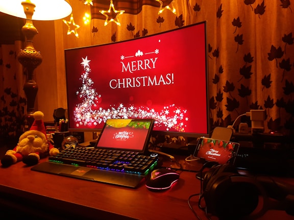 Festive studio setup with microphones, headphones, and Christmas decorations
