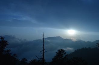 A serene mountain landscape at sunrise symbolizing peace and mindfulness.