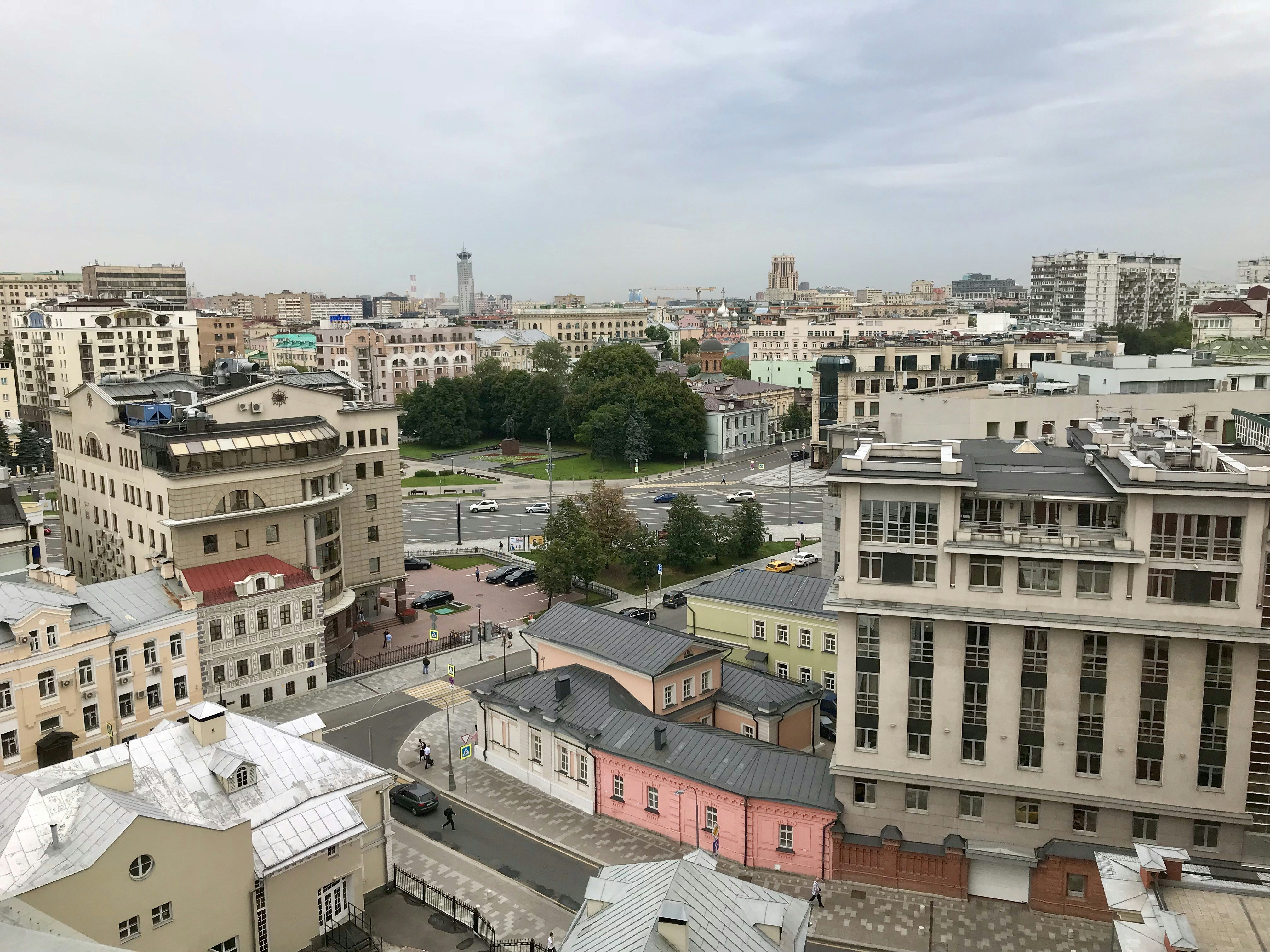 a view of a city from the top of a building