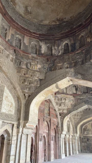 Ornate marble jali work from a historic Rajasthani palace, highlighting intricate geometric patterns