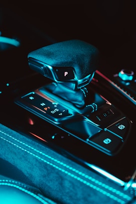 a close up of a car's gear box