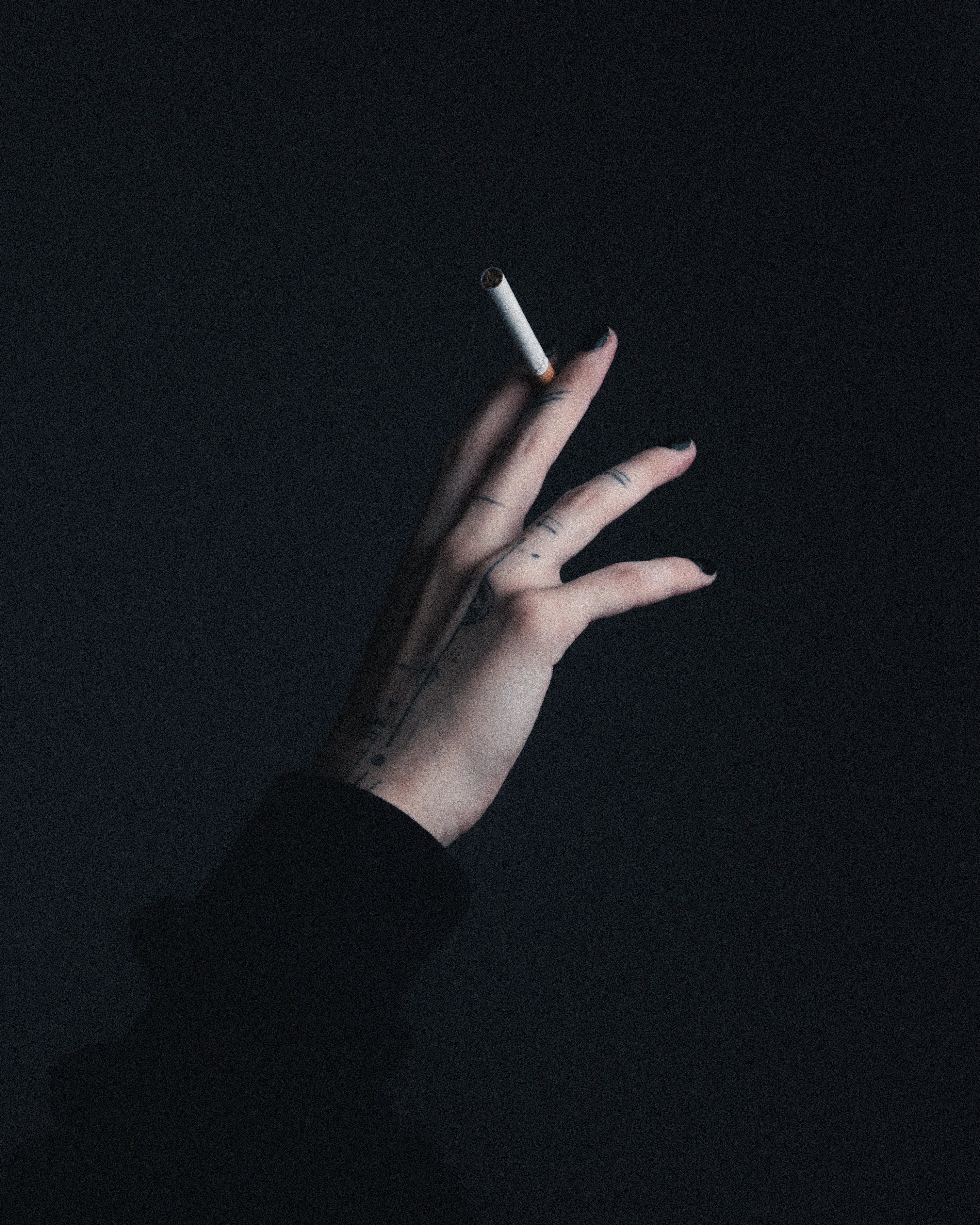 female hand holding cigarette Womans Stock Illustration 57831106 A woman's hand holding a
