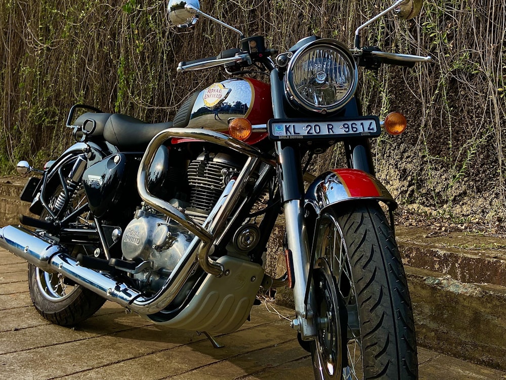 a motorcycle is parked on a wooden platform