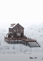 Winter-ready container home with reinforced insulation and snow-covered roof.